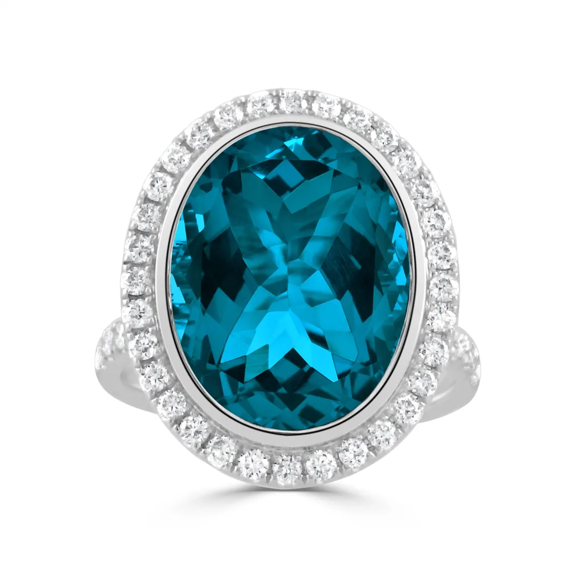 Doves 18K White Gold Bezel Set Oval London Blue Topaz with Diamond Halo Ring